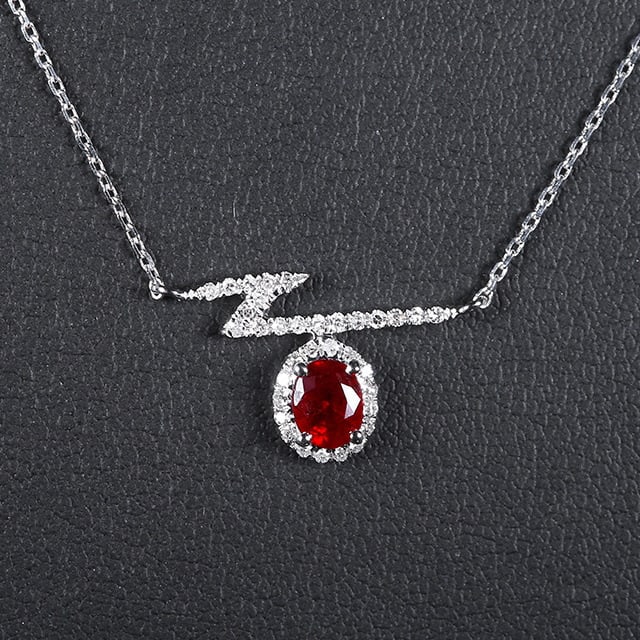 14k Gold 0.46 Ctw Natural Ruby & Diamond Necklace: Ref:230970110 // gold content:14k gold // main gemstone:ruby // shape:oval // carat weight:0. 36ct // color:red // treatment:natural // // adjacent gemstone 2 : diamond // number of stones:34 //