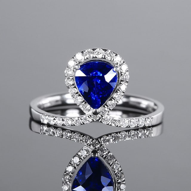 14k Gold 1.58 Ctw Natural Sapphire & Diamond Ring: Ref:230970113 // gold content:14k gold // ring size:7. 25us // // main gemstone:sapphire // shape:pear // carat weight:1. 28ct // color:royal blue // treatment:natural // // adjacent gemstone 2 :