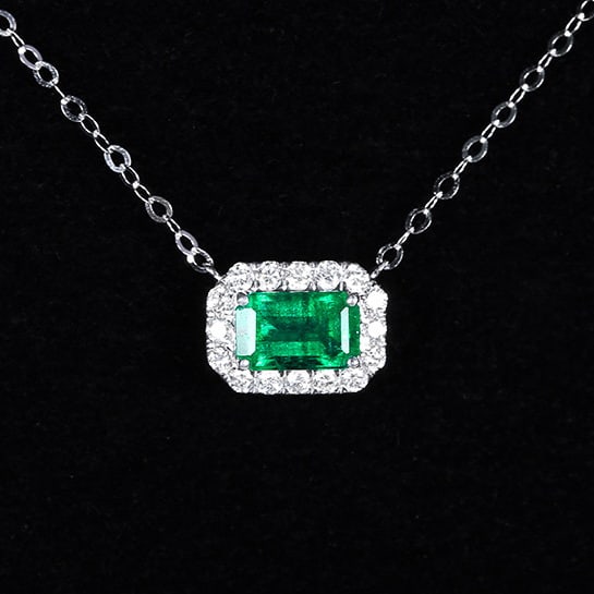 14k Gold 0.82 Ctw Vivid Green Natural Emerald & Diamond Necklace: Ref:230970118 // gold content:14k gold // main gemstone:emerald // shape:octagonal // carat weight:0. 63ct // color:vivid green // treatment:natural // // adjacent gemstone 2 : diamond // number of