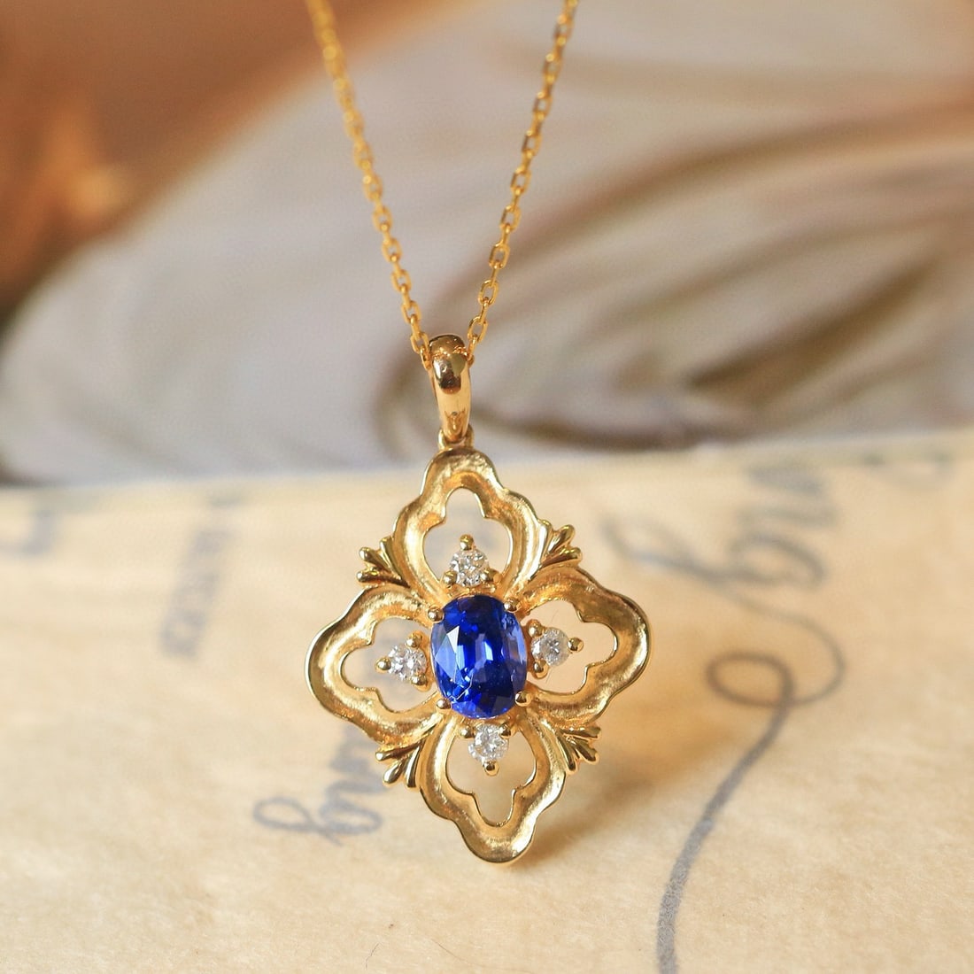 14k Gold 0.65 Ctw Natural Sapphire & Diamond Pendant( Without Chain ): Ref:230970136 // gold content:14k gold // main gemstone:sapphire // shape:oval // carat weight:0. 55ct // color:blue // treatment:natural // // adjacent gemstone 2 : diamond // shape:round // carat