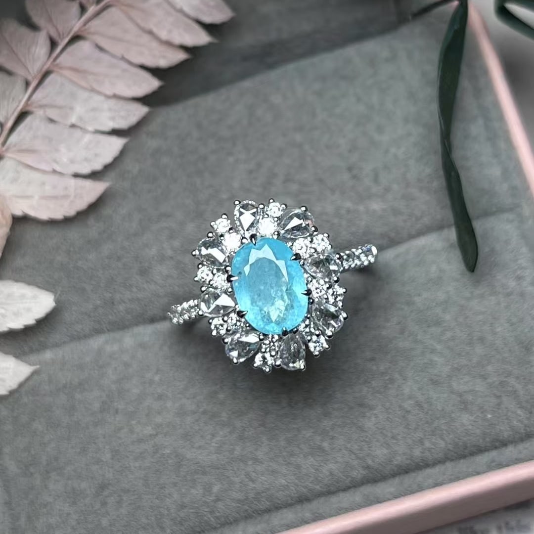 14k Gold 2.02 Ctw Natural Paraiba Tourmaline & Diamond Ring: Ref:230970174 // gold content:14k gold // ring size:7. 25us // // main gemstone:paraiba tourmaline // shape:oval // carat weight:1. 29ct // color:blue // treatment:natural // // adjacent gemstone
