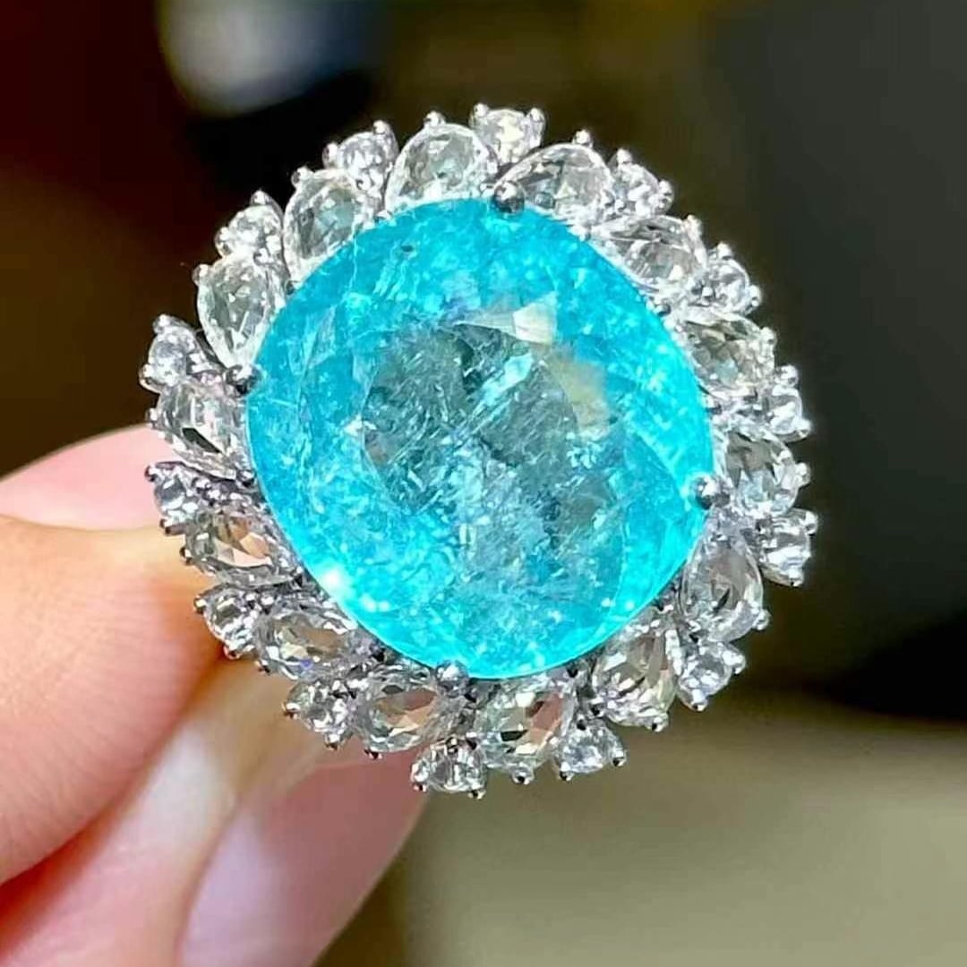 14k Gold 10.6 Ct Natural Paraiba Tourmaline & Diamond & Sapphire Ring: Ref:230970175 // gold content:14k gold // ring size:7. 25us // // main gemstone:paraiba tourmaline // shape:oval // carat weight:10. 6ct // color:blue // treatment:natural // // adjacent gemstone 2 :