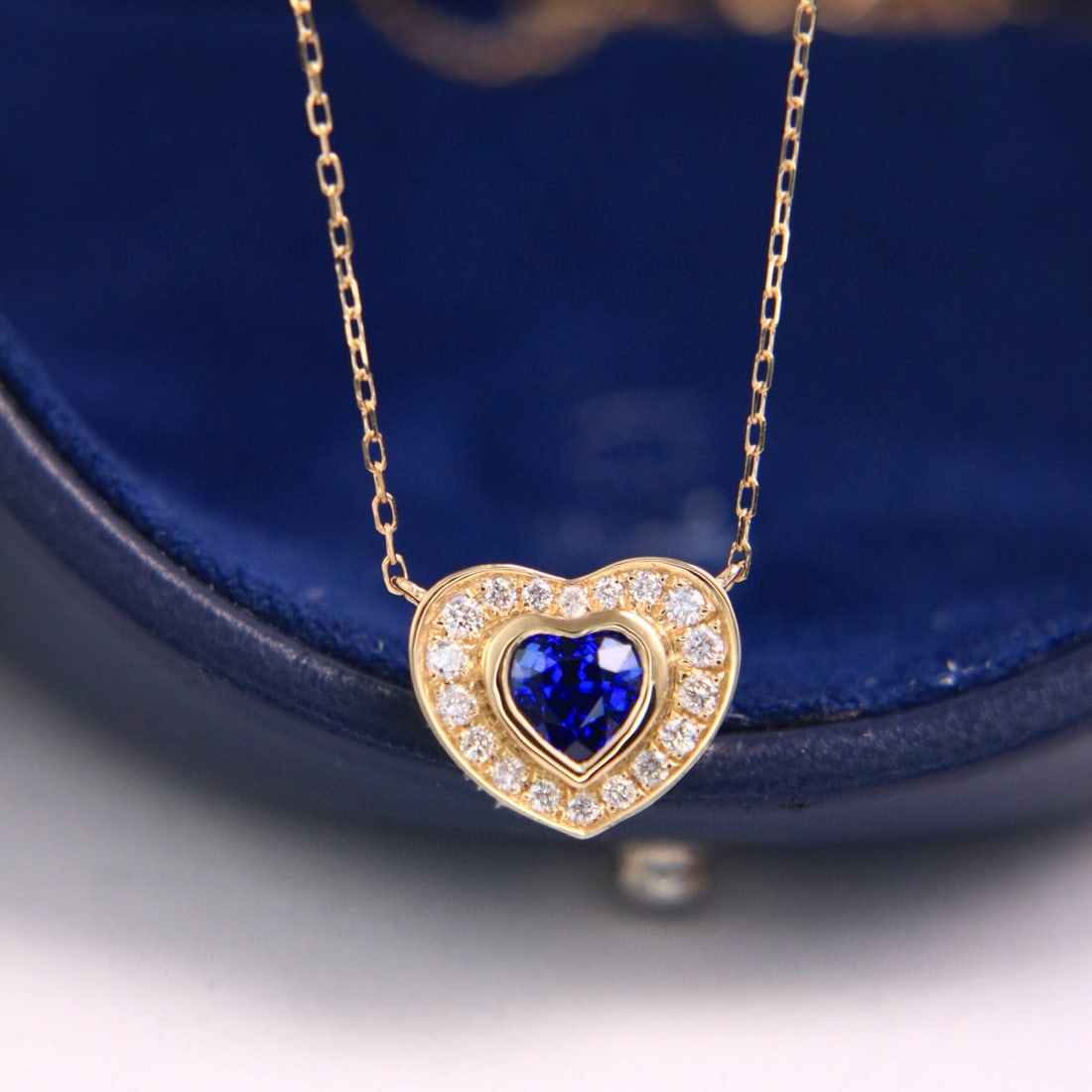 14k Gold 0.66 Ctw Natural Sapphire & Diamond Necklace: Ref:230970184 // gold content:14k gold // main gemstone:sapphire // shape:heart // carat weight:0. 51ct // color:royal blue // treatment:natural // // adjacent gemstone 2 : diamond // shape:round