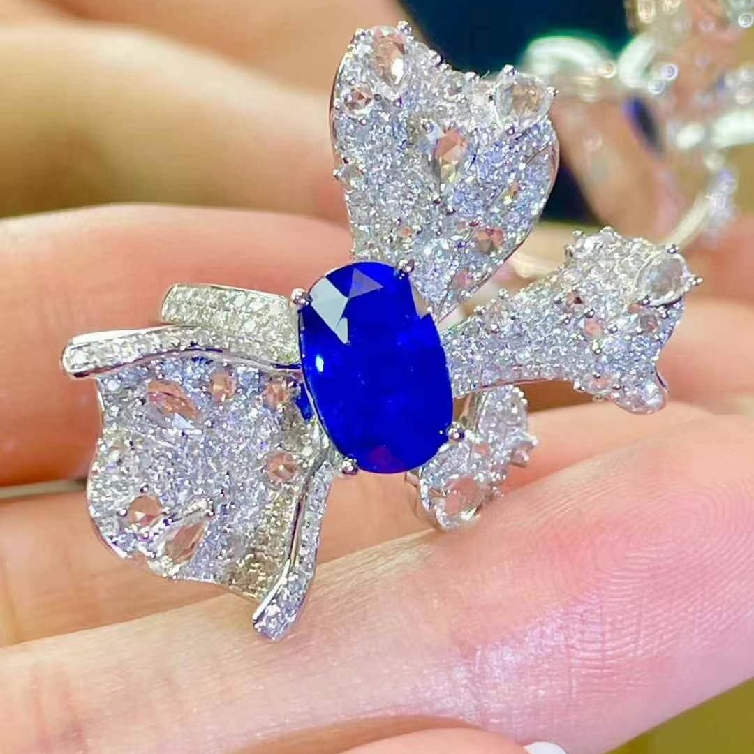 14k Gold 3.3 Ct Natural Sapphire & Diamond & Sapphire Ring: Ref:230970191 // gold content:14k gold // ring size:7. 25us // // main gemstone:sapphire // shape:oval // carat weight:3. 3ct // color:royal blue // treatment:natural // // adjacent gemstone 2 :