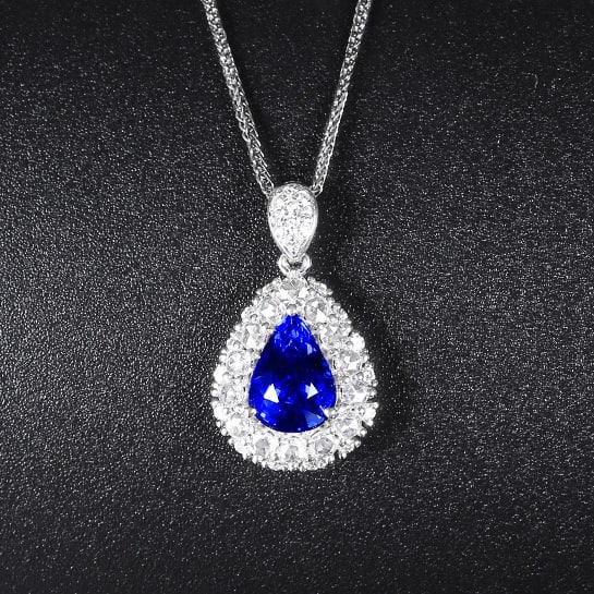14k Gold 1.80 Ctw Natural Sapphire & Diamond Pendant( Without Chain ): Ref:230970194 // gold content:14k gold // main gemstone:sapphire // shape:pear // carat weight:1. 44ct // color:royal blue // treatment:natural // // adjacent gemstone 2 : diamond // number of