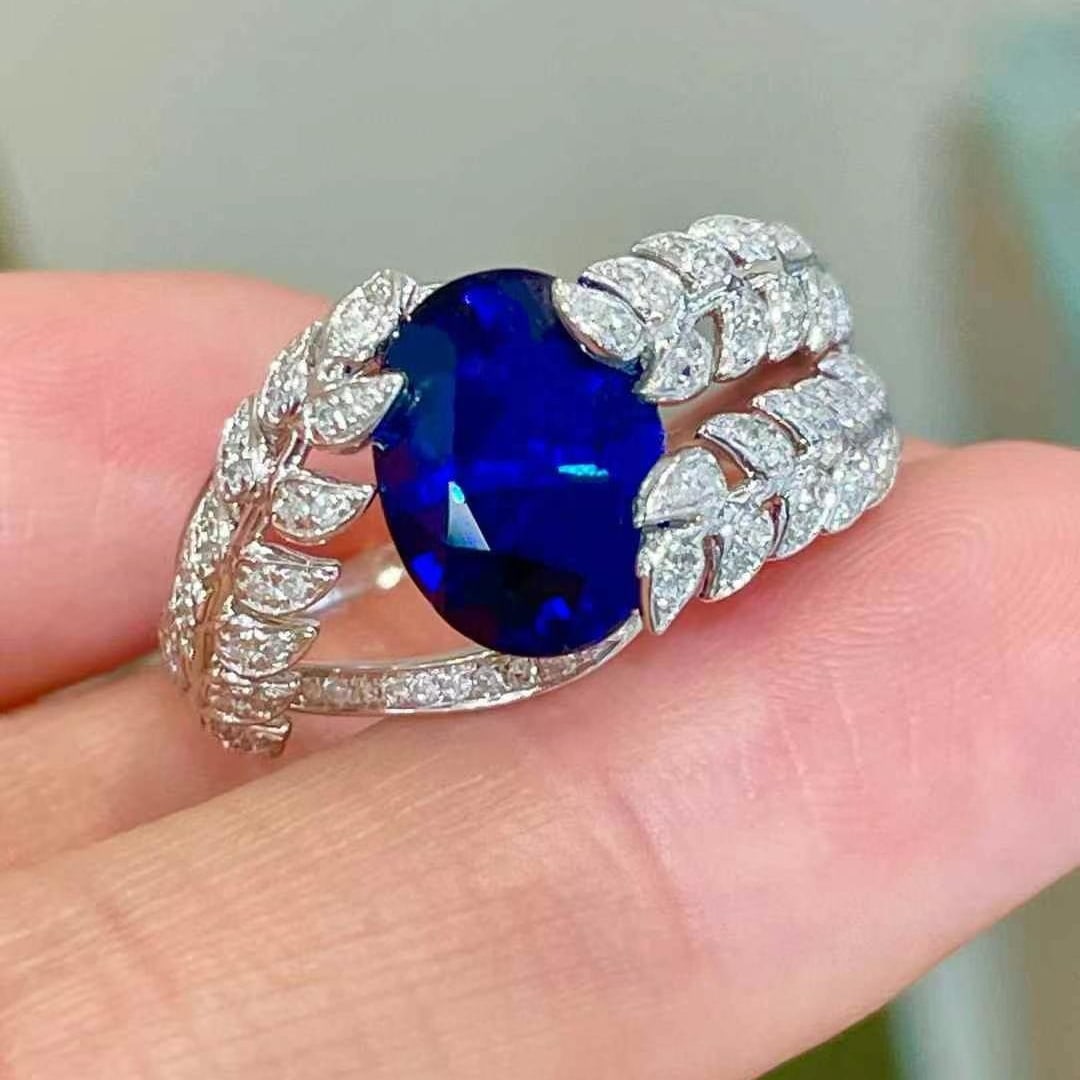 14k Gold 3.5 Ct Natural Sapphire & Diamond Ring: Ref:230970210 // gold content:14k gold // ring size:7. 25us // // main gemstone:sapphire // shape:oval // carat weight:3. 5ct // color:blue // treatment:natural // // adjacent gemstone 2 : diamond