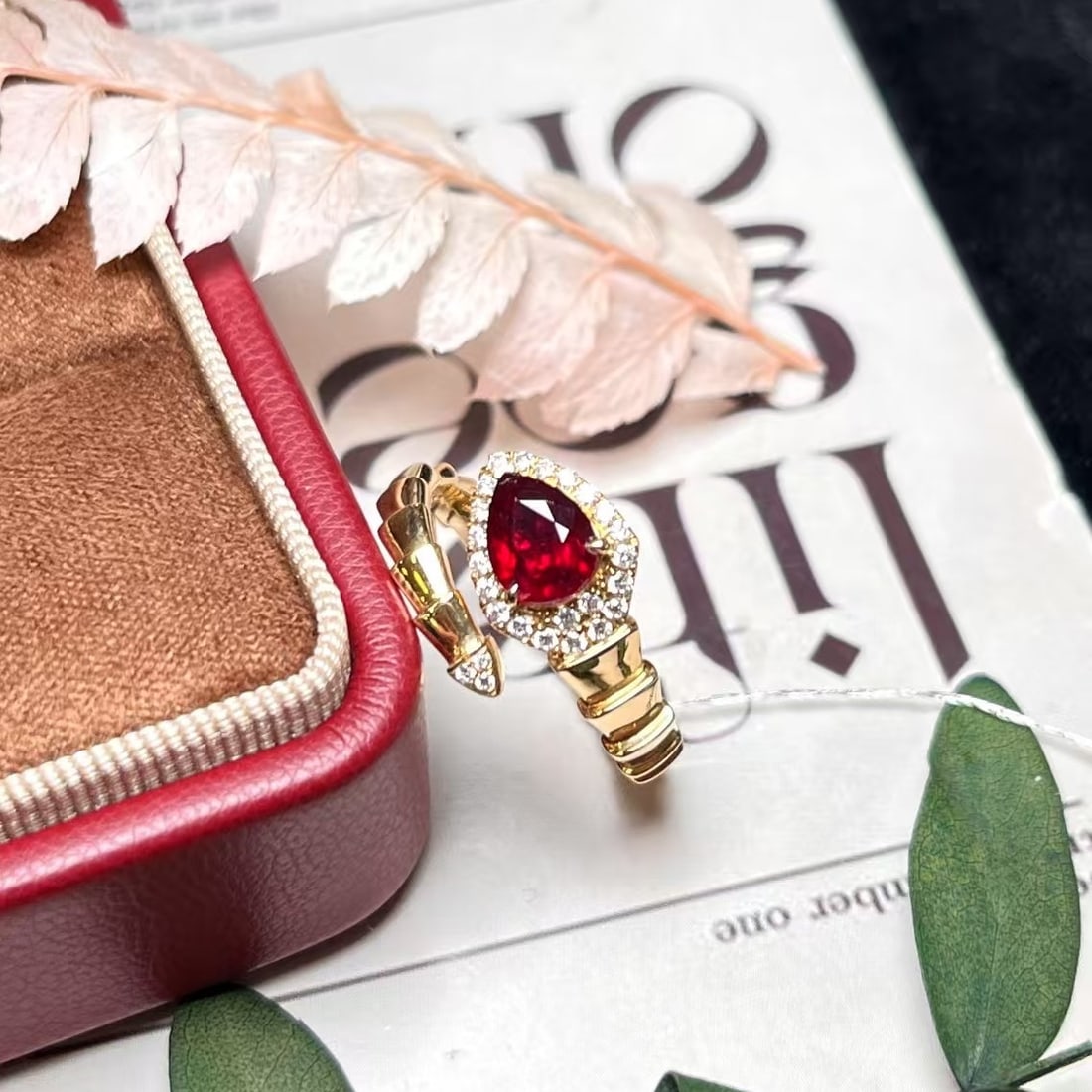 14k Gold 1.04 Ctw Natural Ruby & Diamond Ring: Ref:230970217 // gold content:14k gold // ring size:7. 25us // // main gemstone:ruby // shape:pear // carat weight:0. 88ct // color:pigeonblood red // treatment:natural // // adjacent gemstone 2 :