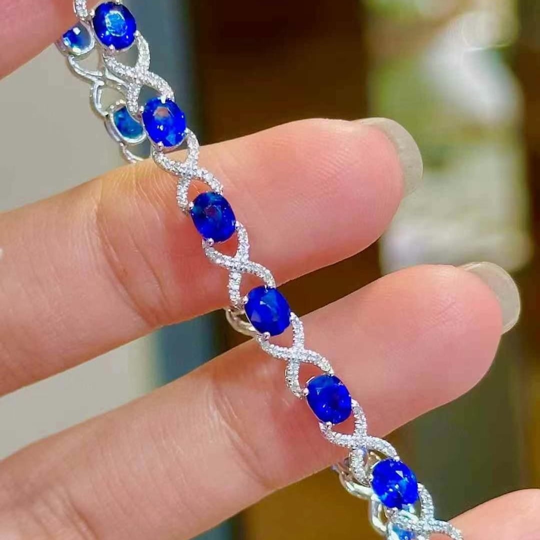 14k Gold 5.57 Ct Natural Sapphire & Diamond Bracelet: Ref:230970222 // gold content:14k gold // main gemstone:sapphire // shape:oval // carat weight:5. 57ct // color:royal blue // treatment:natural // // adjacent gemstone 2 : diamond // shape:round //