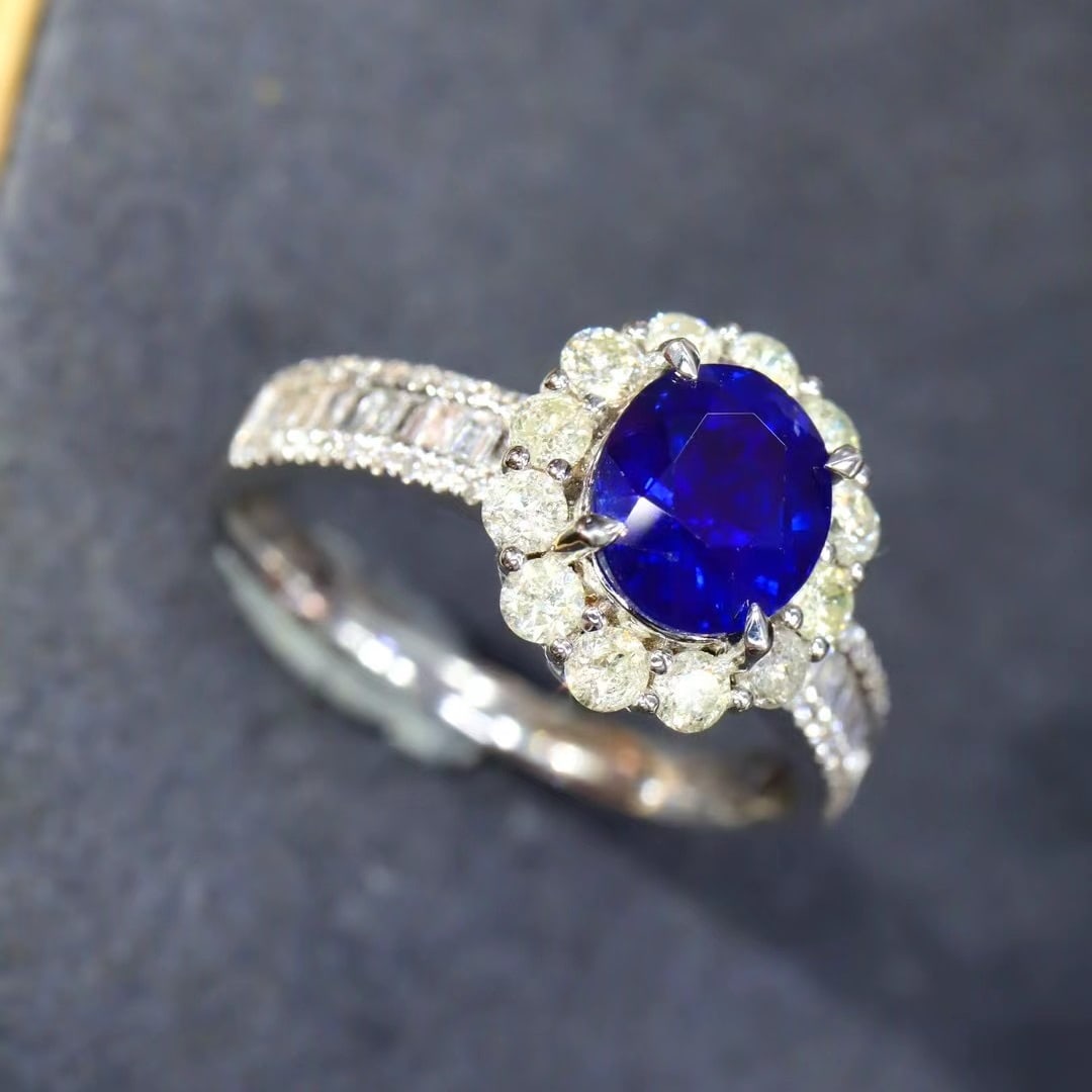 14k Gold 2.29 Ctw Natural Sapphire & Diamond Ring: Ref:230970223 // gold content:14k gold // ring size:7. 25us // // main gemstone:sapphire // shape:oval // carat weight:1. 67ct // color:royal blue // treatment:natural // // adjacent gemstone 2 :