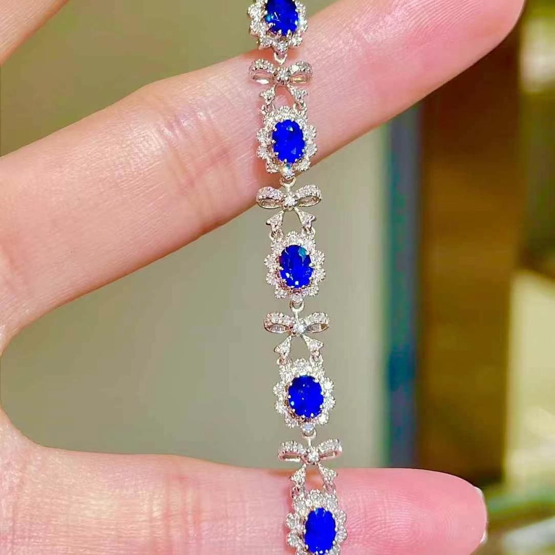 14k Gold 3 Ct Natural Sapphire & Diamond Bracelet: Ref:230970224 // gold content:14k gold // main gemstone:sapphire // shape:oval // carat weight:3ct // color:royal blue // treatment:natural // // adjacent gemstone 2 : diamond // shape:round //