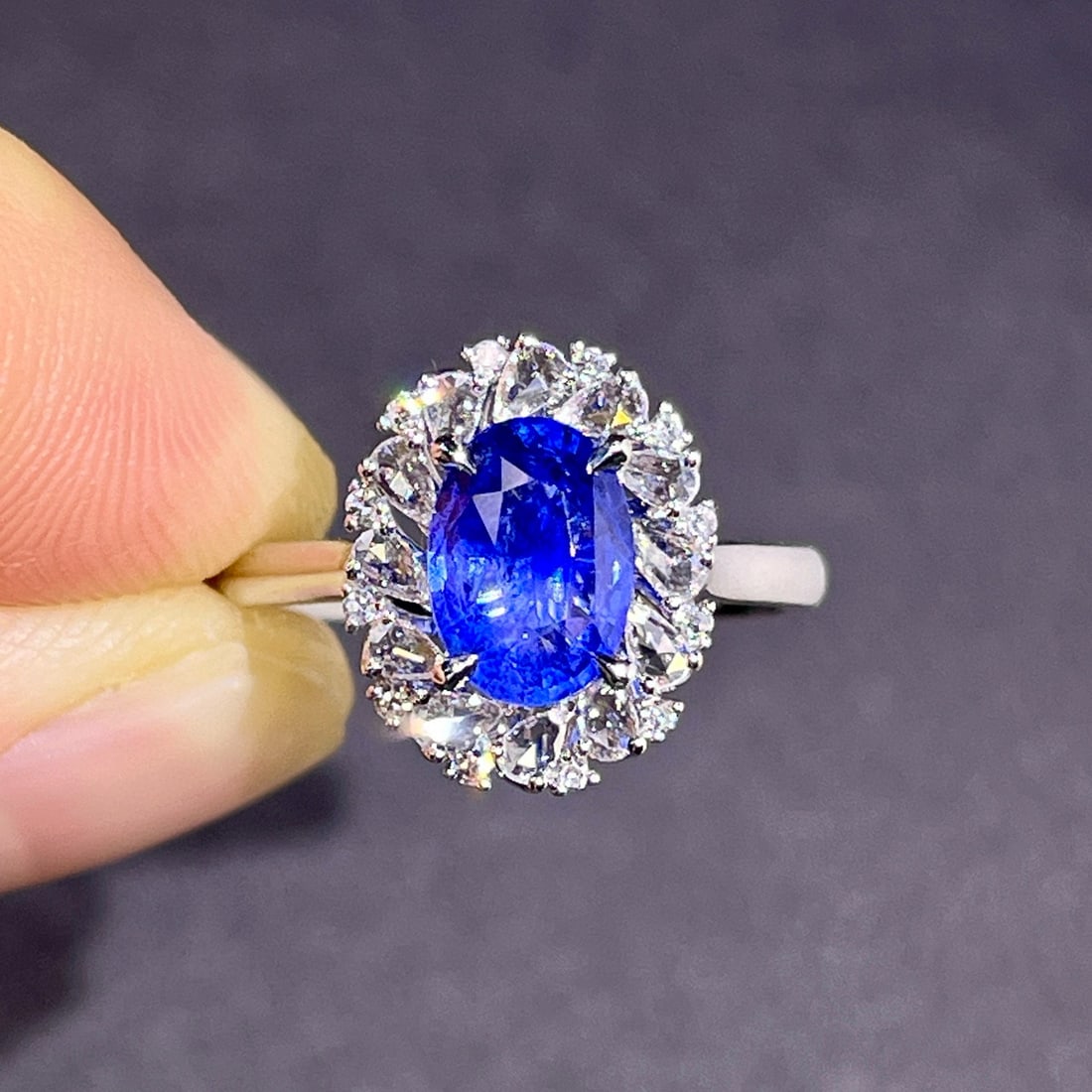 14k Gold 2.33 Ctw Natural Sapphire & Diamond Ring: Ref:230970233 // gold content:14k gold // ring size:7. 25us // // main gemstone:sapphire // shape:oval // carat weight:2. 04ct // color:cornflower blue // treatment:natural // // adjacent gemstone