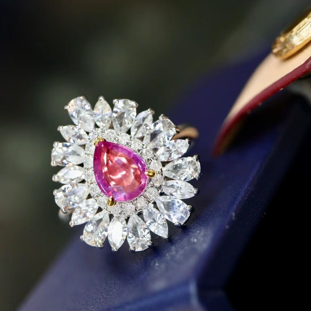 14k Gold 2.92 Ctw Natural Padparadscha Sapphire & Sapphire Ring: Ref:230970251 // gold content:14k gold // ring size:7. 25us // // main gemstone:padparadscha sapphire // shape:pear // carat weight:1. 04ct // color:orangish pink // treatment:natural // //