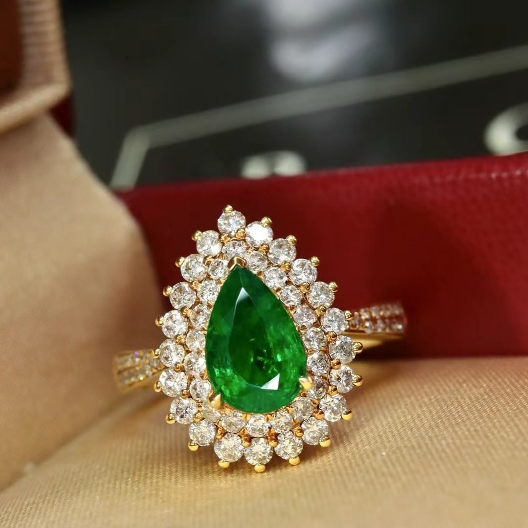 14k Gold 2.37 Ctw Vivid Green Natural Emerald & Diamond Ring: Ref:230970278 // gold content:14k gold // ring size:7. 25us // // main gemstone:emerald // shape:pear // carat weight:1. 01ct // color:vivid green // treatment:natural // // adjacent gemstone 2 : diam