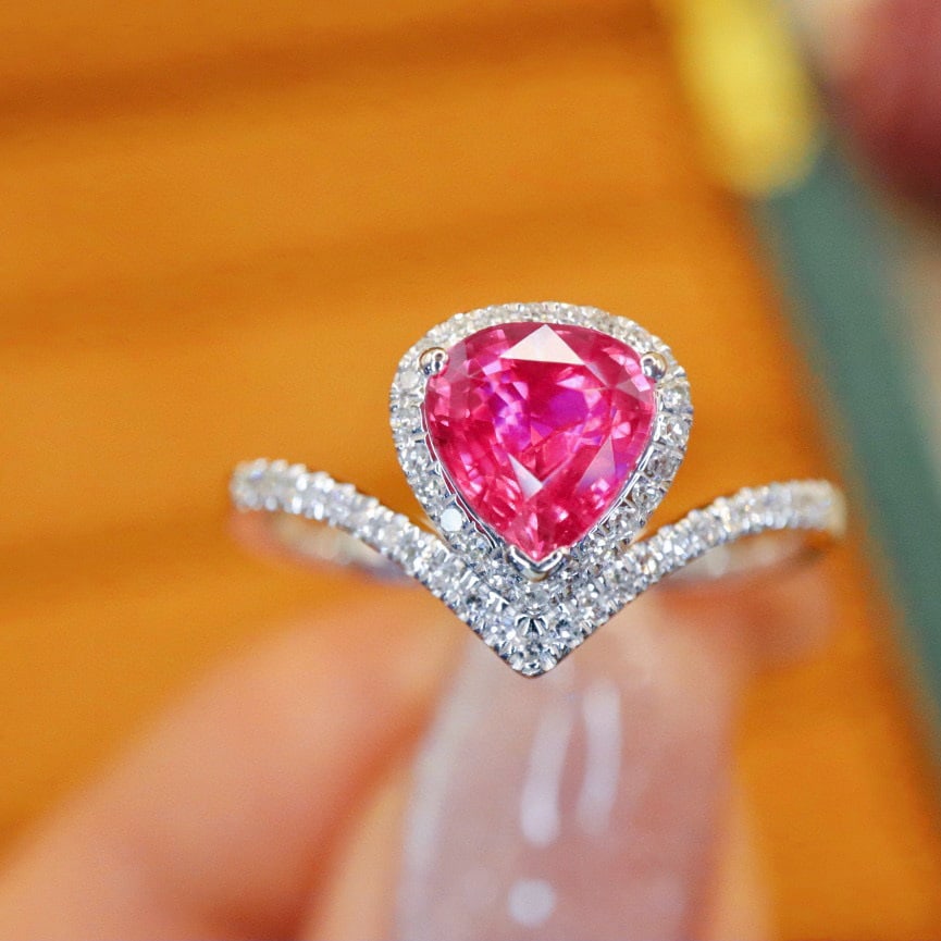 14k Gold 1.21 Ctw Natural Sapphire & Diamond Ring: Ref:230970315 // gold content:14k gold // ring size:7. 25us // // main gemstone:sapphire // shape:pear // carat weight:1. 07ct // color:pink // treatment:natural // // adjacent gemstone 2 :