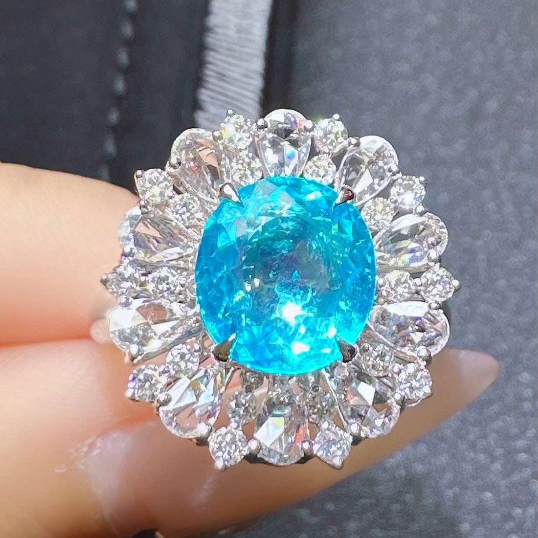 14k Gold 3.28 Ctw Natural Paraiba Tourmaline & Diamond Ring: Ref:230970339 // gold content:14k gold // ring size:7. 25us // // main gemstone:paraiba tourmaline // shape:oval // carat weight:2. 35ct // color:blue // treatment:natural // // adjacent gemstone 2 :