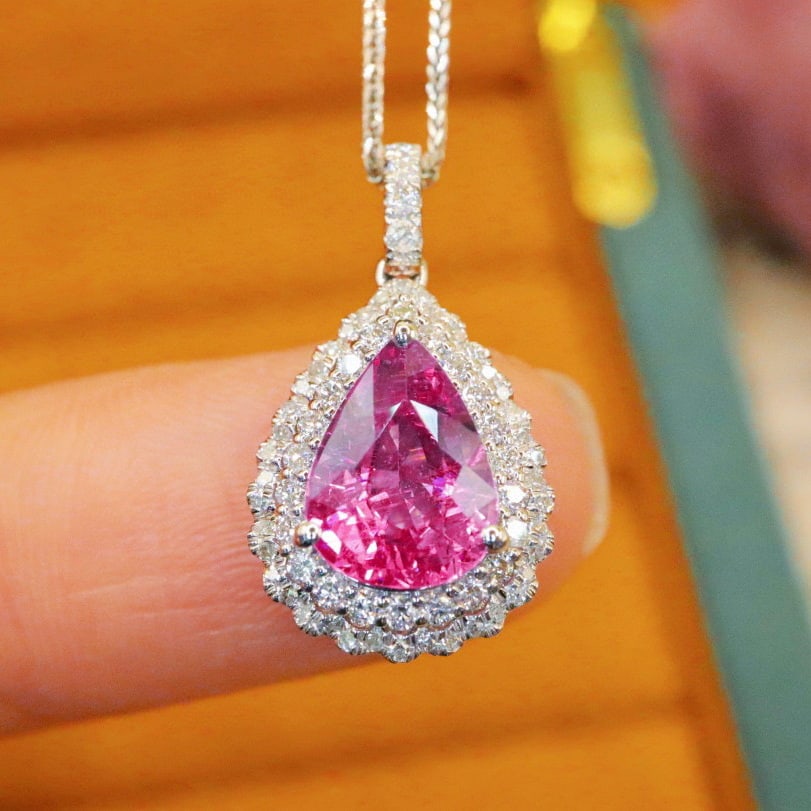 14k Gold 2.59 Ctw Natural Padparadscha Sapphire & Diamond Pendant( Without Chain ): Ref:230970357 // gold content:14k gold // main gemstone:padparadscha sapphire // shape:pear // carat weight:2. 21ct // color:orangish pink // treatment:natural // // adjacent gemstone 2 : diamond // n