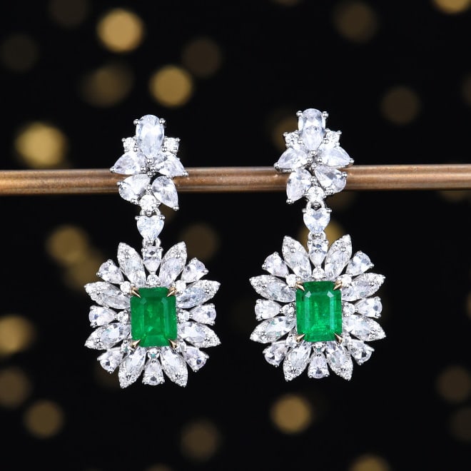 14k Gold 6.89 Ctw Vivid Green Natural Emerald & Sapphire Earrings: Ref:230970370 // gold content:14k gold // main gemstone:emerald // shape:octagonal // carat weight:2. 51ct // color:vivid green // treatment:natural // // adjacent gemstone 2 : sapphire // number