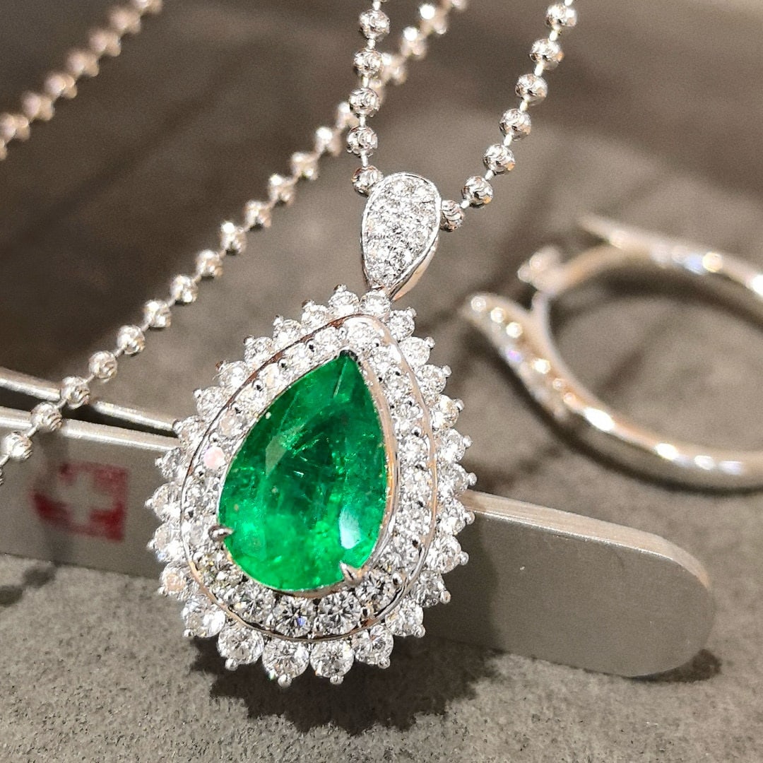 14k Gold 3.86 Ctw Vivid Green Natural Emerald & Diamond Ring/pendant( Without Chain ): Ref:230970385 // gold content:14k gold // ring size:7. 25us // // main gemstone:emerald // shape:pear // carat weight:2. 10ct // color:vivid green // treatment:natural // // adjacent gemstone 2 :
