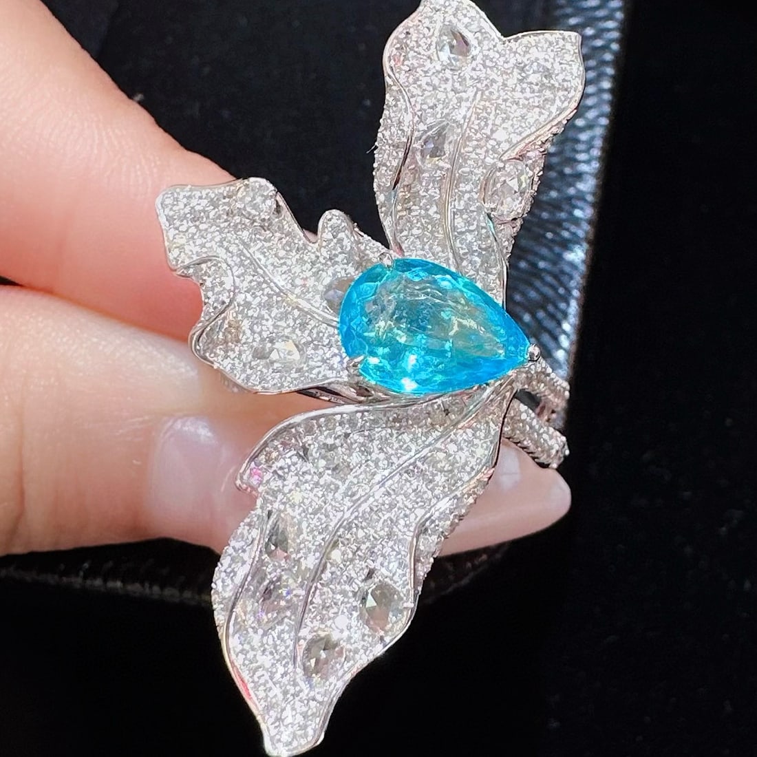 14k Gold 2.99 Ctw Natural Paraiba Tourmaline & Diamond Ring: Ref:230970397 // gold content:14k gold // ring size:7. 25us // // main gemstone:paraiba tourmaline // shape:pear // carat weight:1. 59ct // color:blue // treatment:natural // // adjacent gemstone