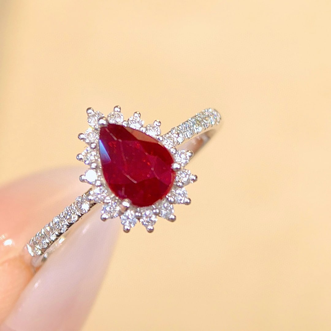 14k Gold 1.28 Ctw Natural Ruby & Diamond Ring: Ref:230970444 // gold content:14k gold // ring size:7. 25us // // main gemstone:ruby // shape:pear // carat weight:1. 00ct // color:pigeonblood red // treatment:natural // // adjacent gemstone 2 : dia