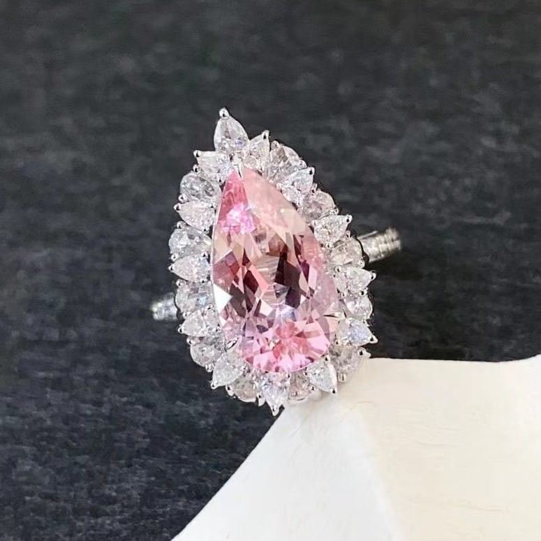 14k Gold 4.67 Ctw Natural Morganite & Diamond Ring: Ref:230971032 // gold content:14k gold // ring size:7. 25us // // main gemstone:morganite // shape:pear // carat weight:3. 36ct // color:cherry blossom color // treatment:natural // // adjacent gemsto
