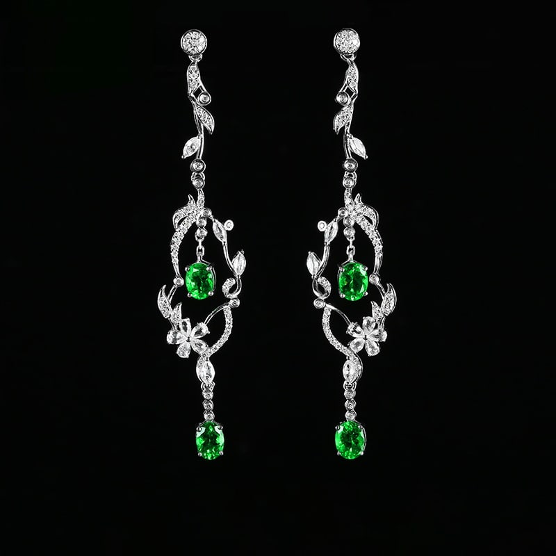 14k Gold 1.93 Ctw Vivid Green Natural Tsavorite & Diamond Earrings: Ref:230971087 // gold content:14k gold // main gemstone:tsavorite // shape:oval // carat weight:1. 6ct // color:vivid green // treatment:natural // // adjacent gemstone 2 : diamond // number of