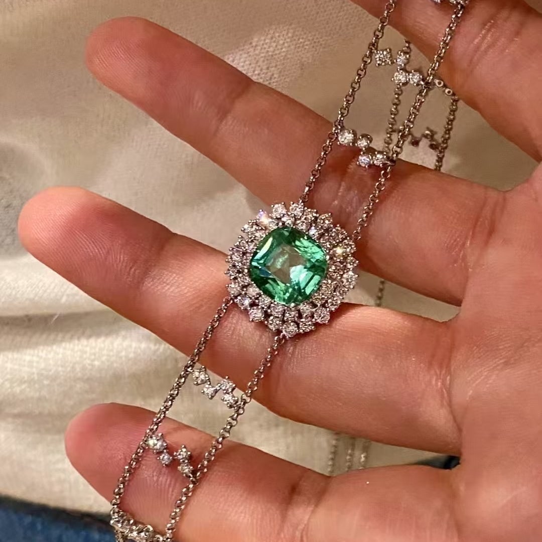 14k Gold 7.70 Ctw Natural Tourmaline & Diamond Necklace: Ref:230971136 // gold content:14k gold // main gemstone:tourmaline // shape:cushion // carat weight:4. 82ct // color:green // treatment:natural // // adjacent gemstone 2 : diamond // shape:round // ca