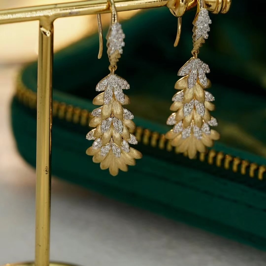 14k Gold 0.6 Ct Natural H Diamond Earrings: Ref:230971168 // gold content:14k gold // main gemstone:diamond // shape:round // carat weight:0. 6ct // clarity grade:vs-si // color:h // treatment:natural // cut grade:g // Condition: NewLow