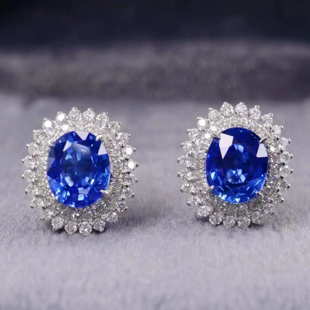 14k Gold 2.09 Ctw Natural Sapphire & Diamond Earrings: Ref:230971198 // gold content:14k gold // main gemstone:sapphire // shape:oval // carat weight:1. 71ct // color:royal blue // treatment:natural // // adjacent gemstone 2 : diamond // shape:round //