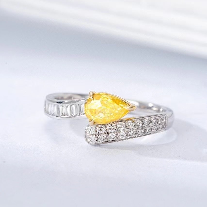 14k Gold 0.77 Ctw Natural Yellow Diamond & Diamond Ring: Ref:230971224 // gold content:14k gold // ring size:7. 25us // // main gemstone:yellow diamond // shape:pear // carat weight:0. 50ct // color:yellow // treatment:natural // // adjacent gemstone 2