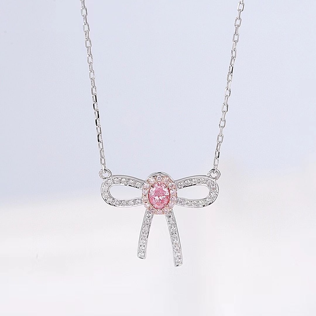 14k Gold 0.25 Ctw Natural Pink Diamond & Diamond Necklace: Ref:230971227 // gold content:14k gold // main gemstone:pink diamond // shape:oval // carat weight:0. 14ct // color:pink // treatment:natural // // adjacent gemstone 2 : diamond // shape:round //