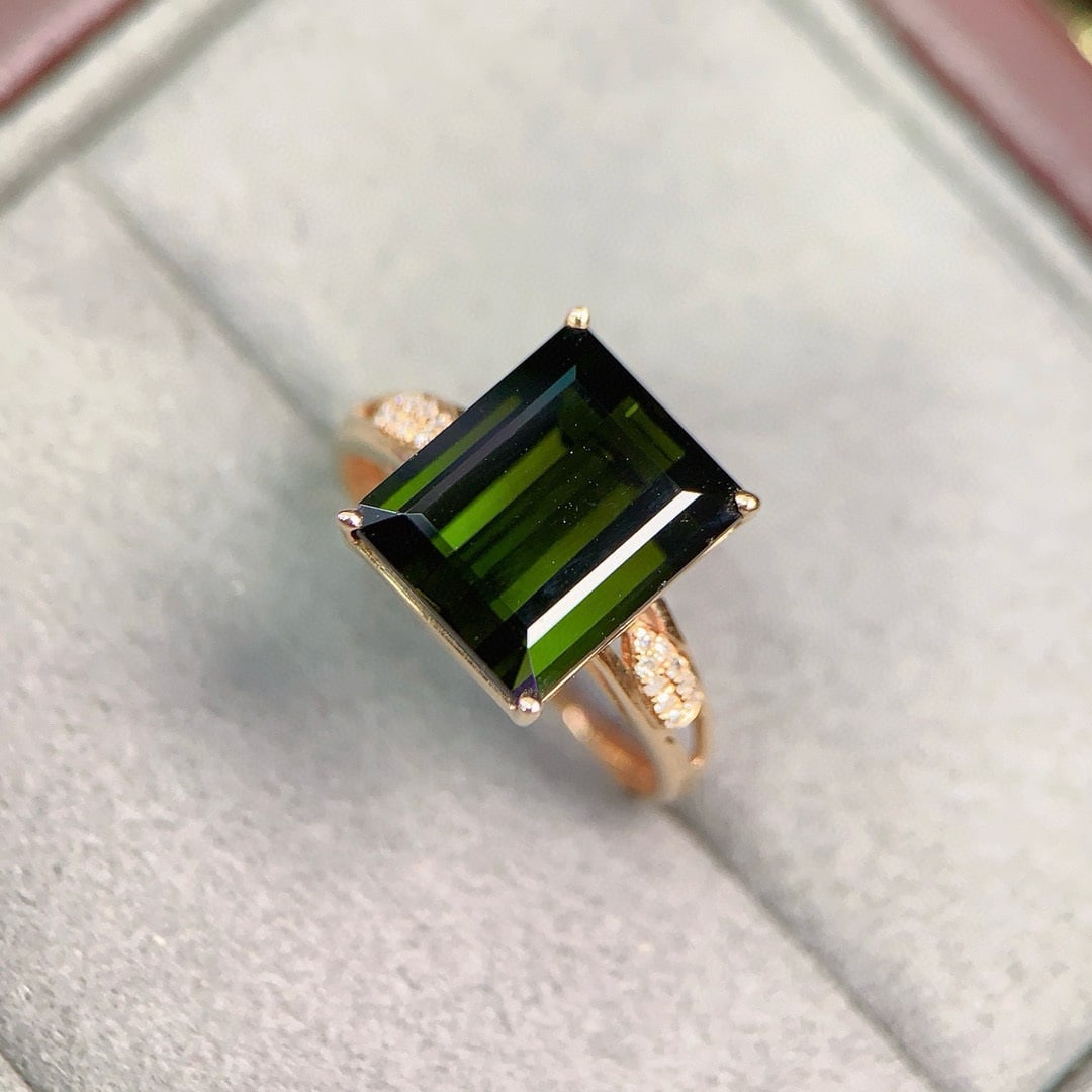 14k Gold 5.70 Ctw Natural Tourmaline & Diamond Ring: Ref:230971251 // gold content:14k gold // ring size:7. 25us // // main gemstone:tourmaline // shape:octagonal // carat weight:5. 65ct // color:green // treatment:natural // // adjacent gemstone 2