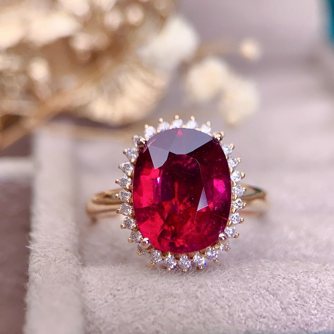14k Gold 4.3 Ct Natural Tourmaline & Diamond Ring: Ref:230971255 // gold content:14k gold // ring size:7. 25us // // main gemstone:tourmaline // shape:oval // carat weight:4. 3ct // color:red // treatment:natural // // adjacent gemstone 2 :