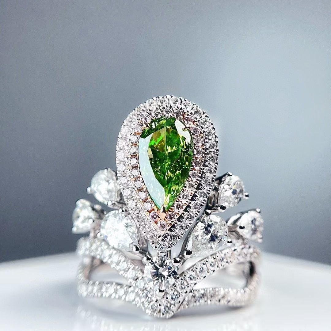 Gia Certified 14k Gold 2.53 Ctw Natural Green Diamond & Diamond Ring: Ref:230972001 // gold content:14k gold // ring size:7. 25us // // main gemstone:green diamond // certified:gia // shape:pear // carat weight:1. 03ct // clarity grade:si1 // color:green //