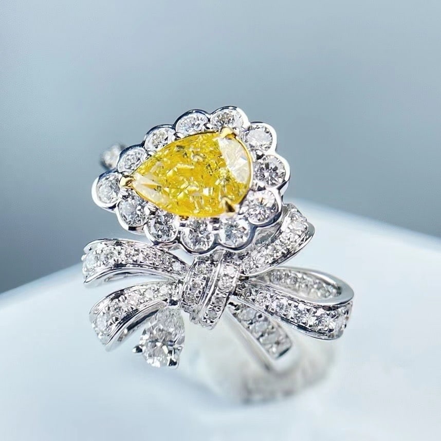 Gia Certified 14k Gold 1.80 Ctw Natural Yellow Diamond & Diamond Ring: Ref:230972010 // gold content:14k gold // ring size:7. 25us // // main gemstone:yellow diamond // certified:gia // shape:pear // carat weight:1. 00ct // clarity grade:si2 // color:yellow //