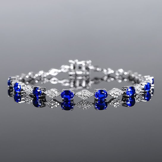 14k Gold 3.17 Ctw Natural Sapphire & Diamond Bracelet: Ref:230972035 // gold content:14k gold // main gemstone:sapphire // shape:oval // carat weight:2. 88ct // color:royal blue // treatment:natural // // adjacent gemstone 2 : diamond // number of