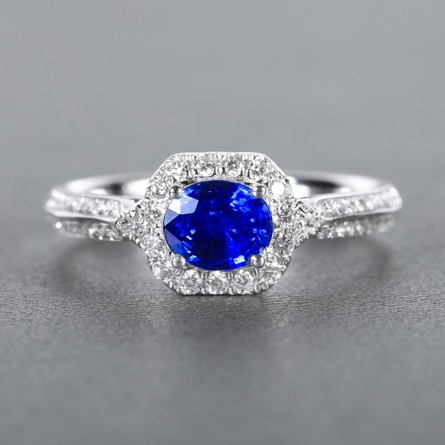 14k Gold 0.96 Ctw Natural Sapphire & Diamond Ring: Ref:230972046 // gold content:14k gold // ring size:7. 25us // // main gemstone:sapphire // shape:oval // carat weight:0. 68ct // color:royal blue // treatment:natural // // adjacent gemstone 2 :