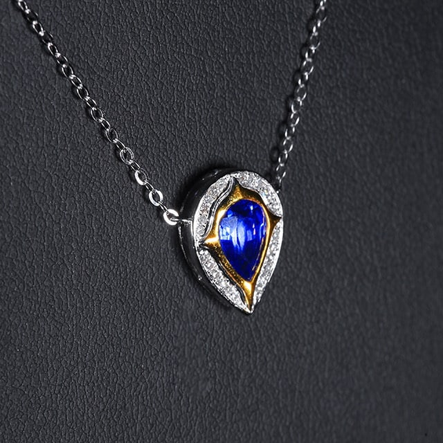 14k Gold 0.95 Ctw Vivid Blue Natural Sapphire & Diamond Necklace: Ref:230972049 // gold content:14k gold // main gemstone:sapphire // shape:pear // carat weight:0. 88ct // color:vivid blue // treatment:natural // // adjacent gemstone 2 : diamond // number of