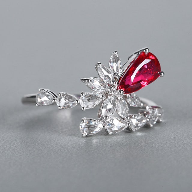 14k Gold 1.58 Ctw Natural Ruby & Diamond Ring: Ref:230972087 // gold content:14k gold // ring size:7. 25us // // main gemstone:ruby // shape:pear // carat weight:1. 02ct // color:red // treatment:natural // // adjacent gemstone 2 : diamond //