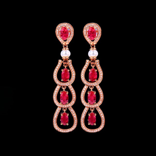14k Gold 3.11 Ctw Natural Ruby & Diamond Earrings: Ref:230972122 // gold content:14k gold // main gemstone:ruby // shape:oval // carat weight:2. 5ct // color:red // treatment:natural // // adjacent gemstone 2 : diamond // number of stones:204 // shape