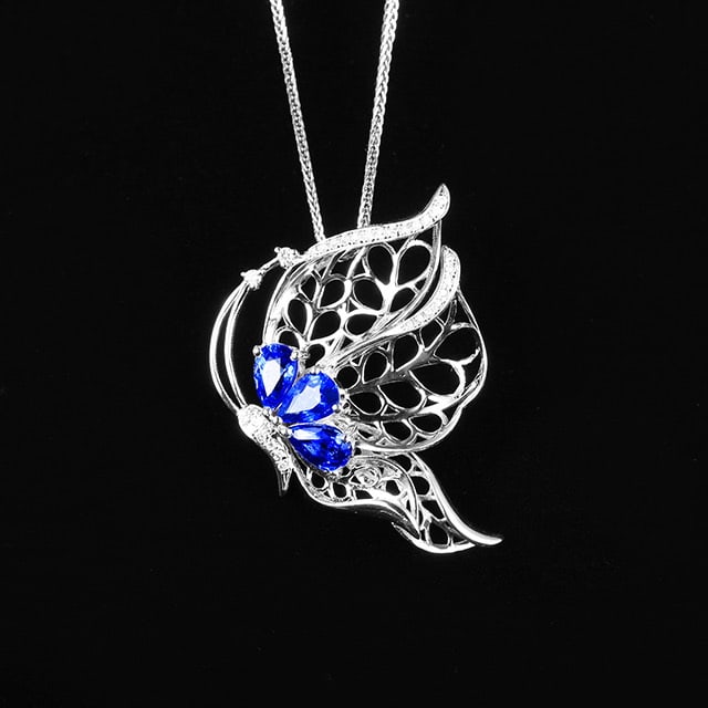 14k Gold 1.54 Ctw Vivid Blue Natural Sapphire & Diamond & Butterfly Pendant( Without Chain ): Ref:230972132 // gold content:14k gold // main gemstone:sapphire // shape:pear // carat weight:1. 43ct // color:vivid blue // treatment:natural // // adjacent gemstone 2 : diamond // number of