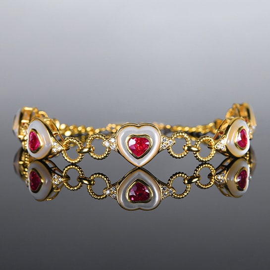 14k Gold 2.71 Ctw Natural Ruby & Diamond Bracelet: Ref:230972137 // gold content:14k gold // main gemstone:ruby // shape:heart // carat weight:2. 35ct // color:pigeonblood red // treatment:natural // // adjacent gemstone 2 : diamond // number of
