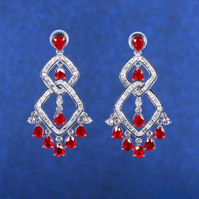 14k Gold 4.62 Ctw Natural Ruby & Diamond Earrings: Ref:230972150 // gold content:14k gold // main gemstone:ruby // shape:pear // carat weight:3. 65ct // color:pigeonblood red // treatment:natural // // adjacent gemstone 2 : diamond // number of