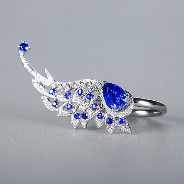 14k Gold 1.67 Ctw Natural Sapphire & Diamond Ring: Ref:230972159 // gold content:14k gold // ring size:7. 25us // // main gemstone:sapphire // shape:pear // carat weight:1. 42ct // color:royal blue // treatment:natural // // adjacent gemstone 2 :