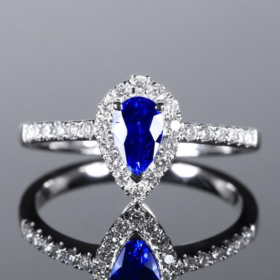 14k Gold 1.01 Ctw Natural Sapphire & Diamond Ring: Ref:230972166 // gold content:14k gold // ring size:7. 25us // // main gemstone:sapphire // shape:pear // carat weight:0. 70ct // color:royal blue // treatment:natural // // adjacent gemstone 2 :