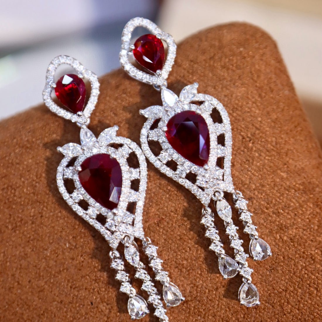 14k Gold 3.25 Ctw Vivid Red Natural Ruby & Diamond Earrings: Ref:230972191 // gold content:14k gold // main gemstone:ruby // shape:pear // carat weight:2. 21ct // color:vivid red // treatment:natural // // adjacent gemstone 2 : diamond // shape:multiply // cara