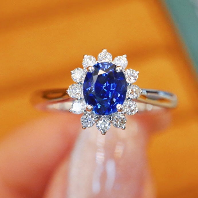 14k Gold 1.28 Ctw Natural Sapphire & Diamond Ring: Ref:230972232 // gold content:14k gold // ring size:7. 25us // // main gemstone:sapphire // shape:oval // carat weight:1. 07ct // color:royal blue // treatment:natural // // adjacent gemstone 2 :