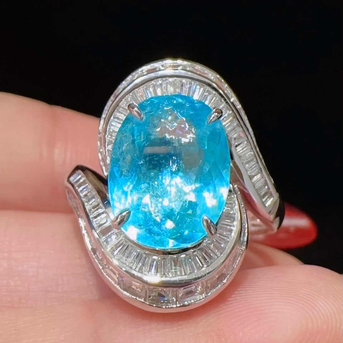 14k Gold 3.88 Ctw Natural Paraiba Tourmaline & Diamond Ring: Ref:230972234 // gold content:14k gold // ring size:7. 25us // // main gemstone:paraiba tourmaline // shape:oval // carat weight:3. 08ct // color:neon blue // treatment:natural // // adjacent