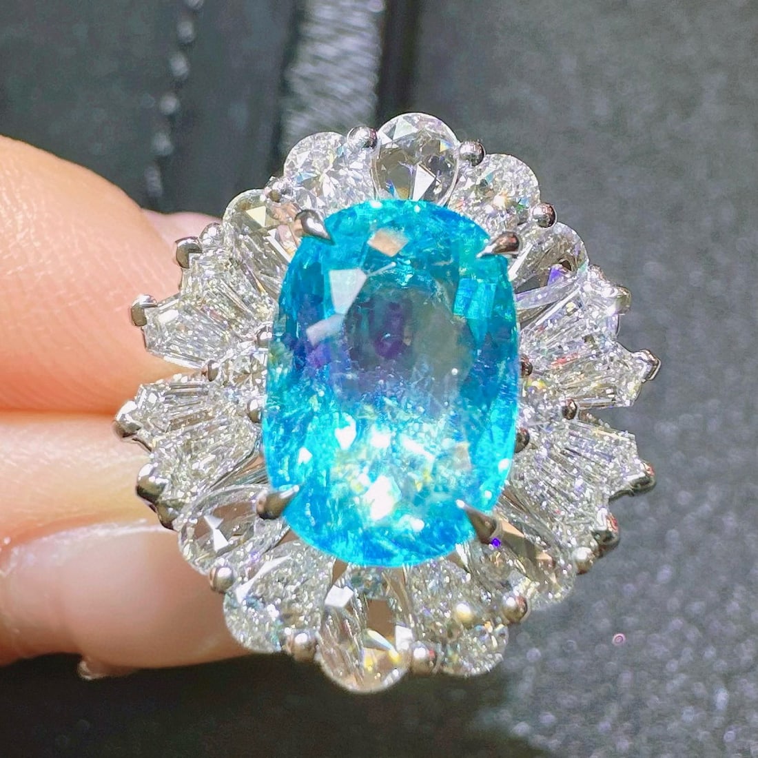 14k Gold 4.91 Ctw Natural Paraiba Tourmaline & Diamond Ring: Ref:230972294 // gold content:14k gold // ring size:7. 25us // // main gemstone:paraiba tourmaline // shape:oval // carat weight:3. 07ct // color:neon blue // treatment:natural // // adjacent
