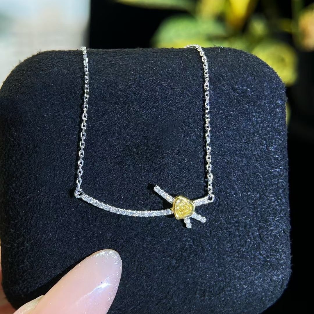 14k Gold 0.27 Ctw Natural Yellow Diamond & Diamond Necklace: Ref:230972350 // gold content:14k gold // main gemstone:yellow diamond // shape:heart // carat weight:0. 15ct // color:yellow // treatment:natural // // adjacent gemstone 2 : diamond // shape:round